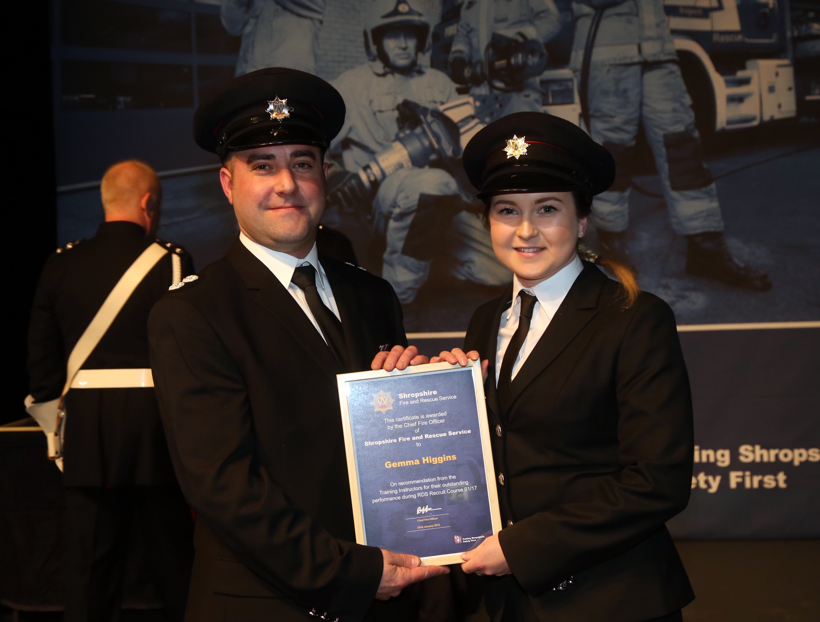 Firefighter Gemma Higgins, from Wem was one of three new recruits to receive an award from instructor Matt Angell for their outstanding performance during training