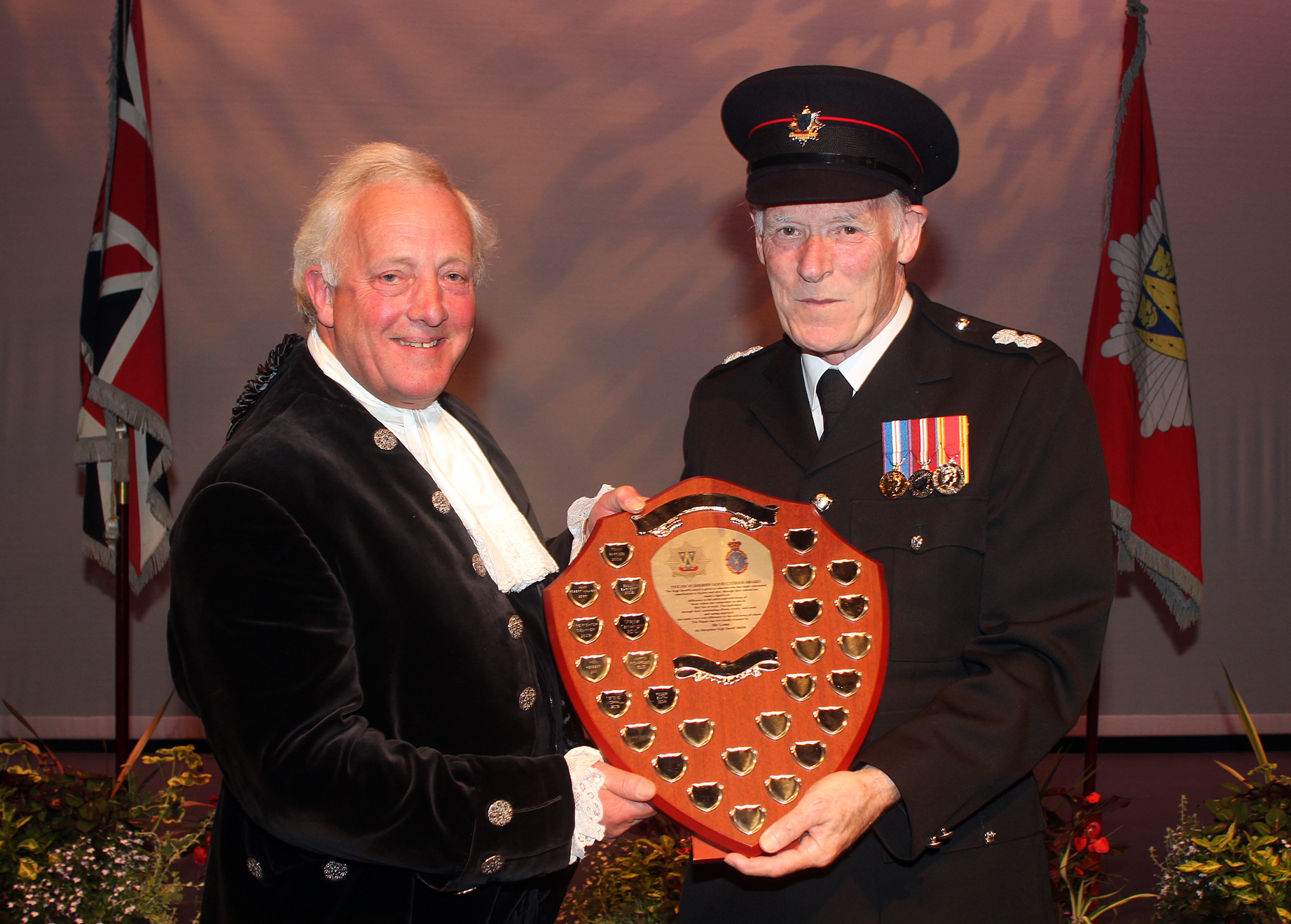 Shropshire High Sheriff Roger Bland presents Roger Smith with his award