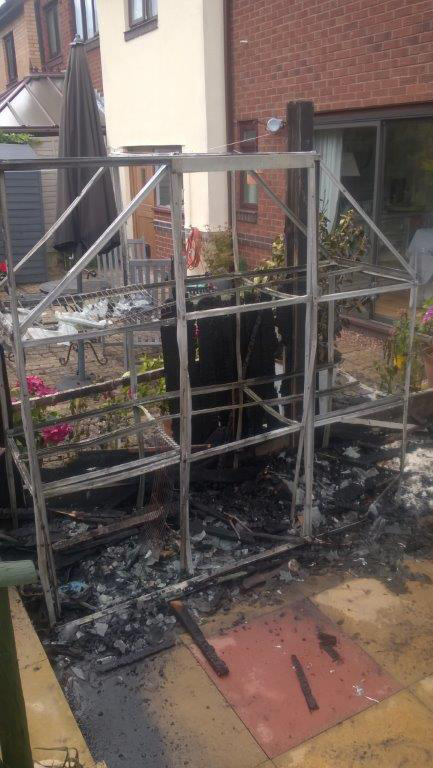 A greenhouse was destroyed in another fire caused by a gas burner as flames spread towards a Telford house. 
