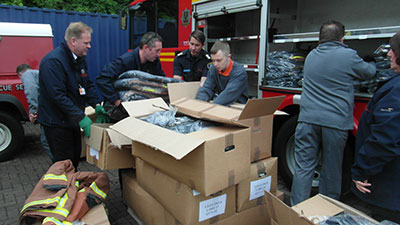 Packing donated kit into a fire appliance