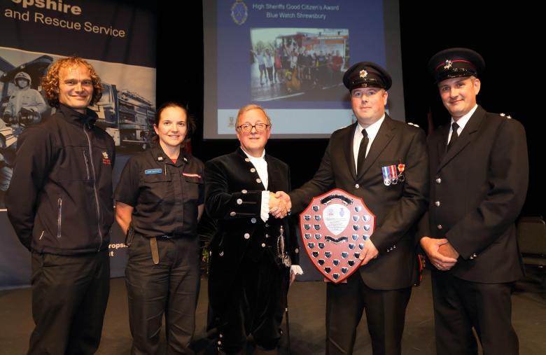 Blue Watch, Shrewsbury, were one of many award winners at last night's ceremony. Here they receive the Good Citizens’ Award from High Sheriff Charles Lillis for giving fun and laughter to children from Chernobyl who they have hosted in Shrewsbury every summer for more than 20 years. Left to right, firefighters John Robinson, Annie Nicholas, Richard Meadows and Paul Gray with Eric Carter (centre) vice chair of Shropshire and Wrekin Fire Authority.