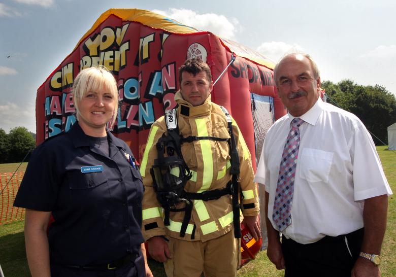 2 firefighters with Fire Authority member at Crucial Crew in Shropshire
