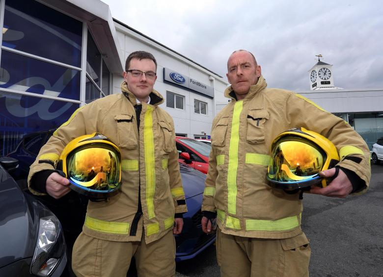 Furrows employees Chris Smith and Glen Wheatley who are both “on call” firefighters at Wellington Fire Station which wants more new recruits.