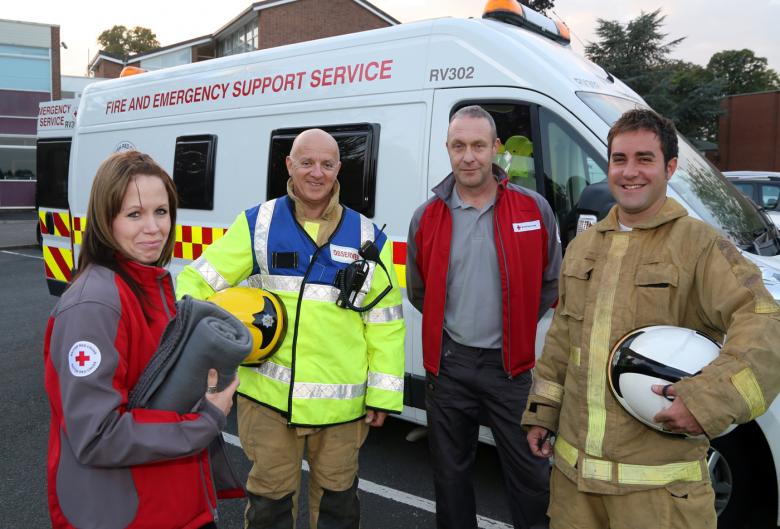 Shropshire fire and rescue officers with Red Cross volunteers