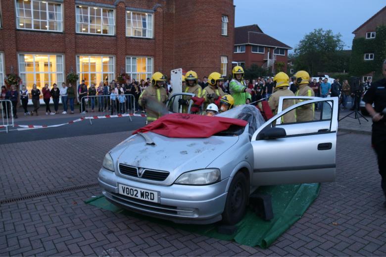 Firefighters "rescue" Harper Adams University student Amy Brough from a destroyed Vauxhall Astra