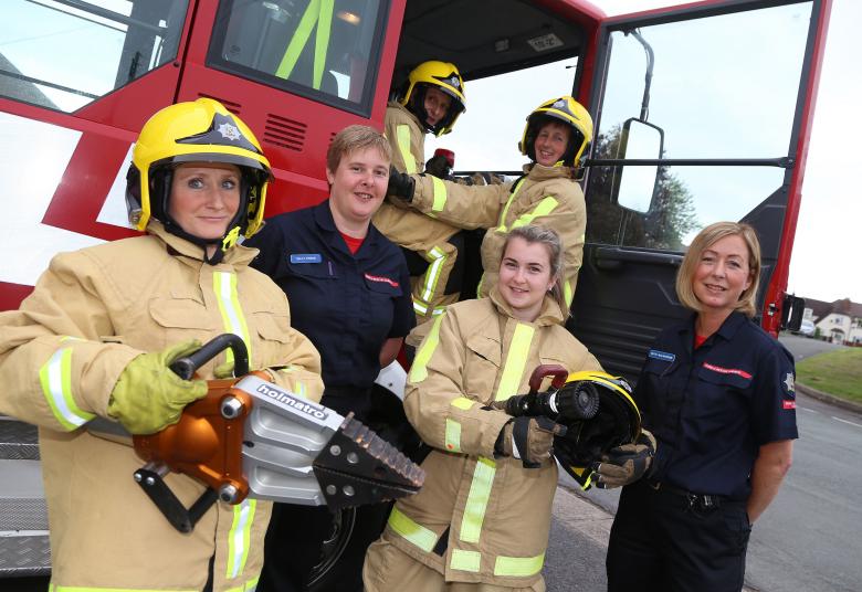 Firefighters Sally Eynon and Ruth Walkerdine at the taster day with women who want to be firefighters. Left to right: Helena Heath and Gemma Higgins with Julie Collins in the cab and Pam Neill.