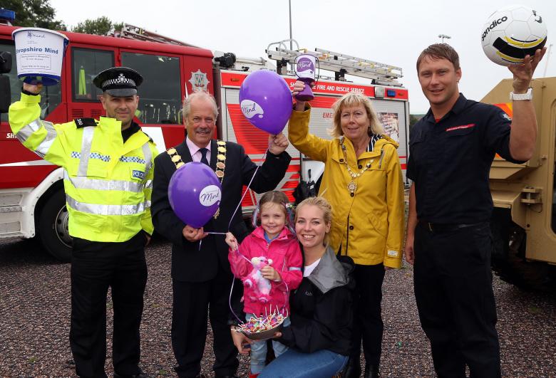 Shrewsbury Charity Fun Day, left to right, police officer Marv Choudhury, Mayor and Mayoress of Shrewsbury Peter and Julie Nutting with firefighter Andy Davies. Front are Anna Rouse and daughter Beau Kelly (age 5). 