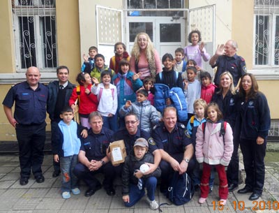 Group photo of orphans, staff and Shropshire visitors