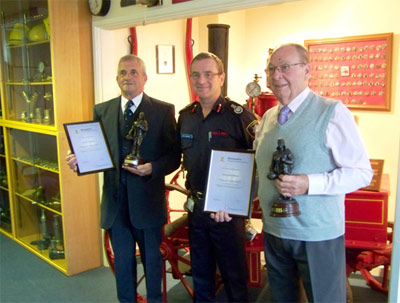 Josh and Pete receiving presentations from CFO Paul Raymond