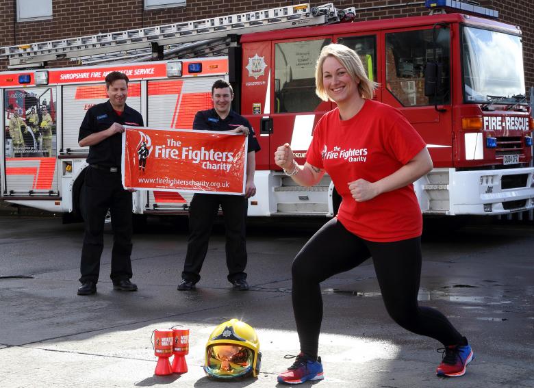 Clun firefighter Kat Frost gets ready for the London Marathon in aid of the Fire Fighters Charity pictured at Shrewsbury Fire Station with Shrewsbury firefighters Kris Mullins and Stuart Hughes