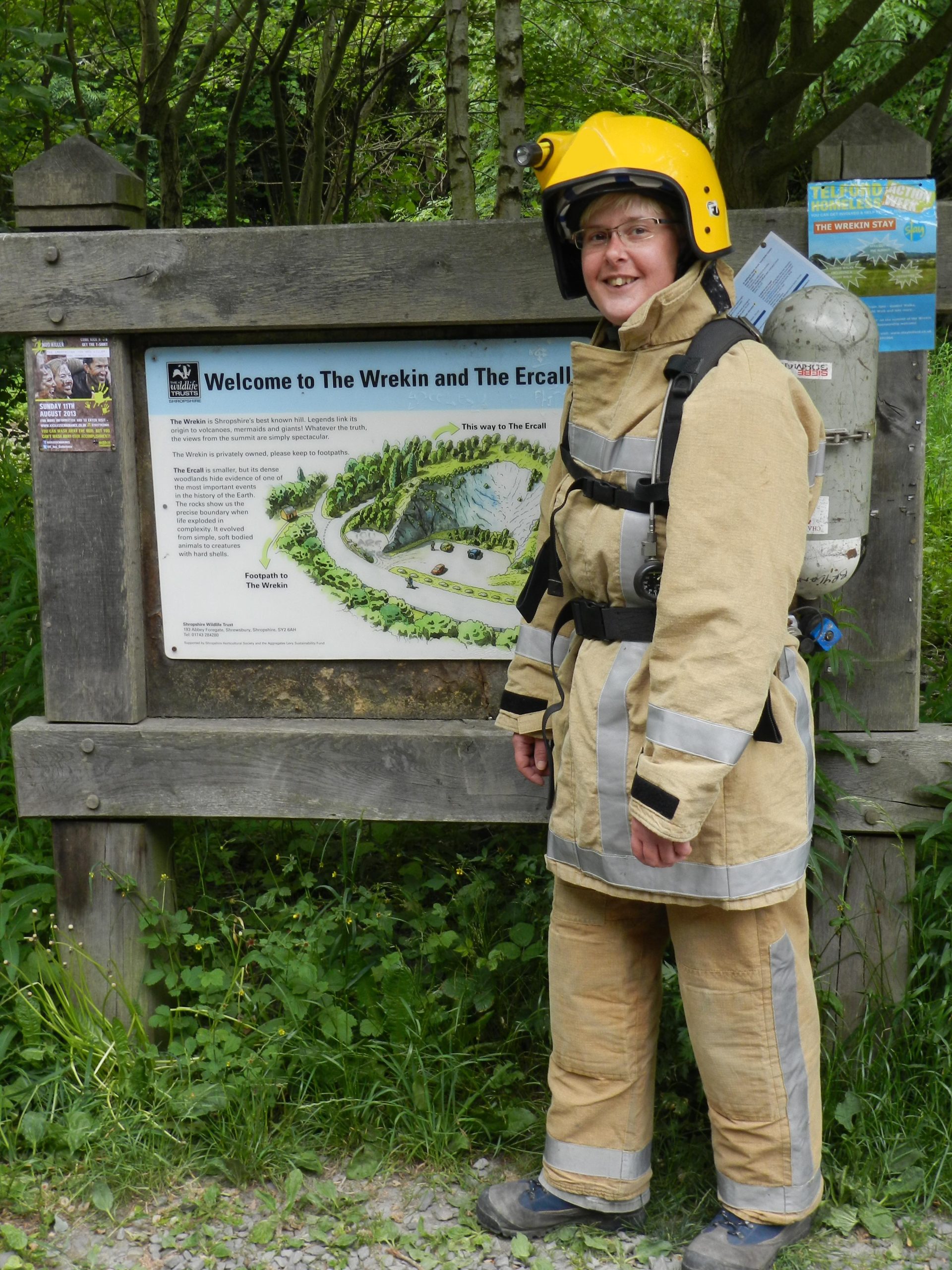 Sally next to the map at the bottom of The Wrekin
