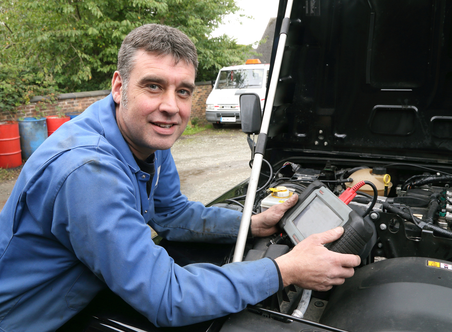 On call firefighter Jeremy Chambers (44), a mechanic at Prees Auto, has dyslexia and Meares Irlen syndrome and is now getting filtered glasses to make reading easier.