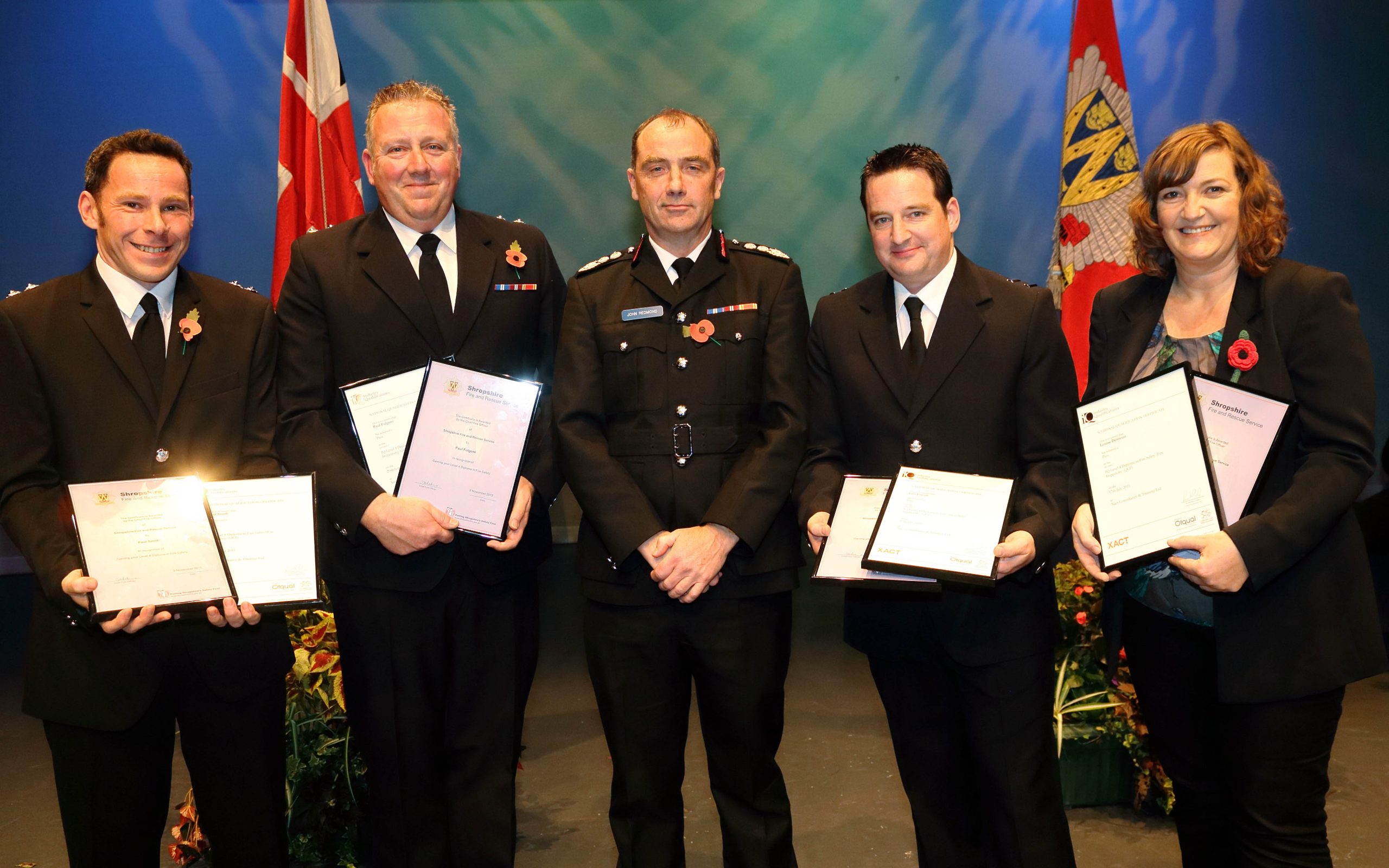 Paul Smith, Paul Fulgoni, Ceri Flavell, and Louise Derricutt, receive their awards.  Lynn Walker was unavailable to attend.
