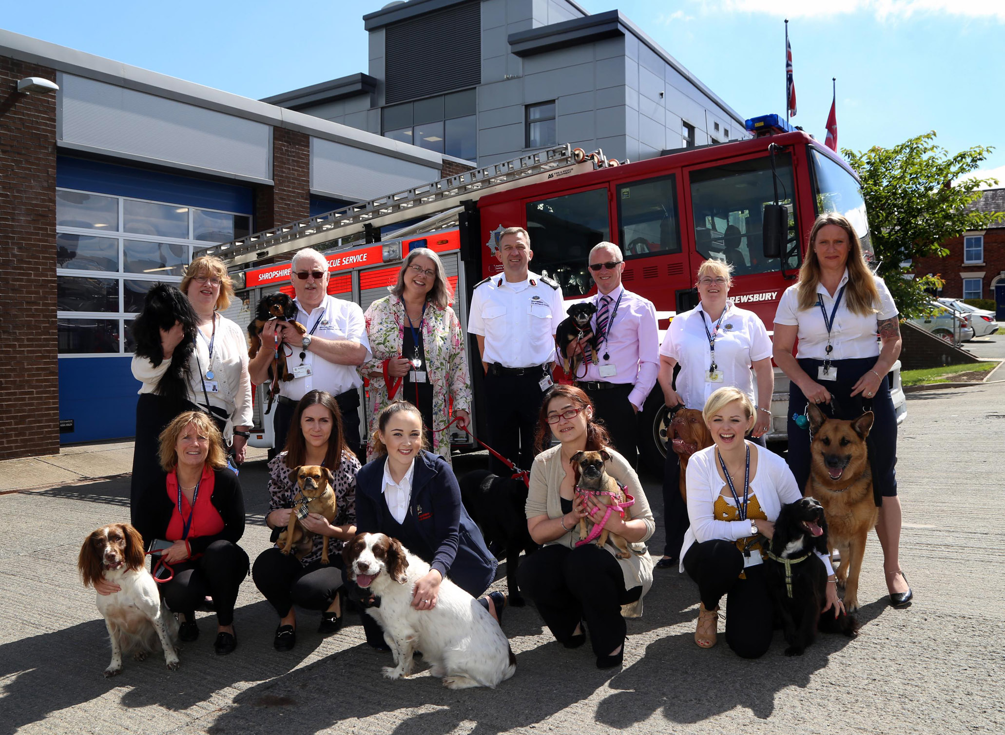 Staff with their pets at Shrewsbury fire HQ as part of the annual Bring Your Dog to Work Day. Pictured with Chief Fire Officer Rod Hammerton