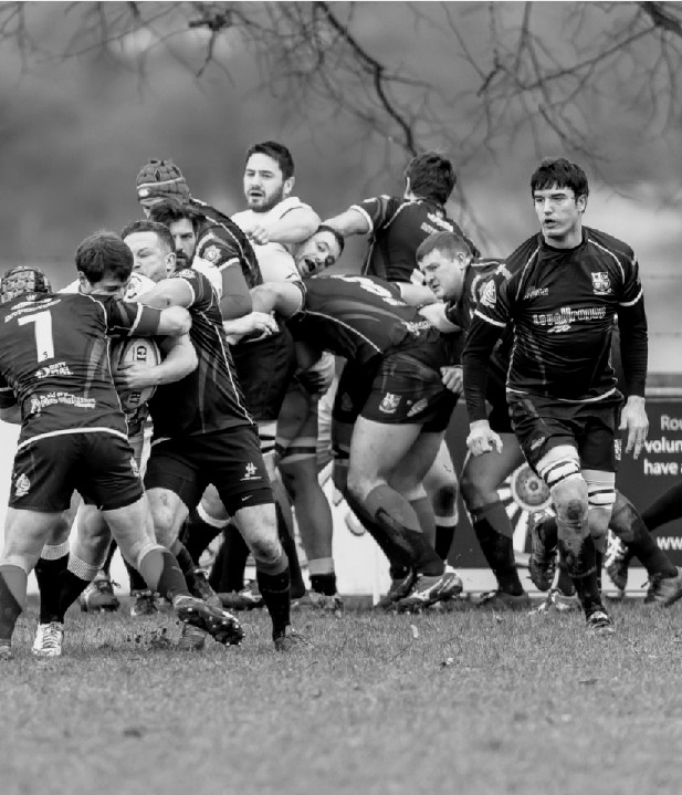 Ludlow firefighter George Jacks (pictured right of rugby scrum) gets ready to win the ball back for the UK Lions fire service team