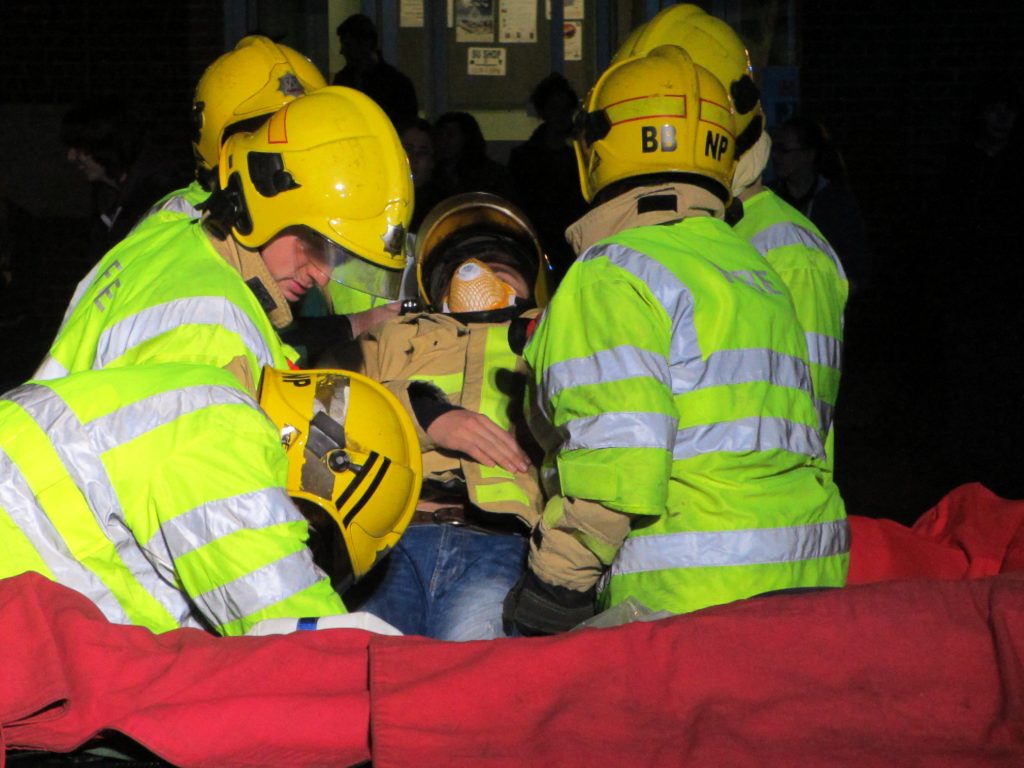 Shropshire firefighters extricate student from Harper Adams University in a mock car crash to educate young people about road safety