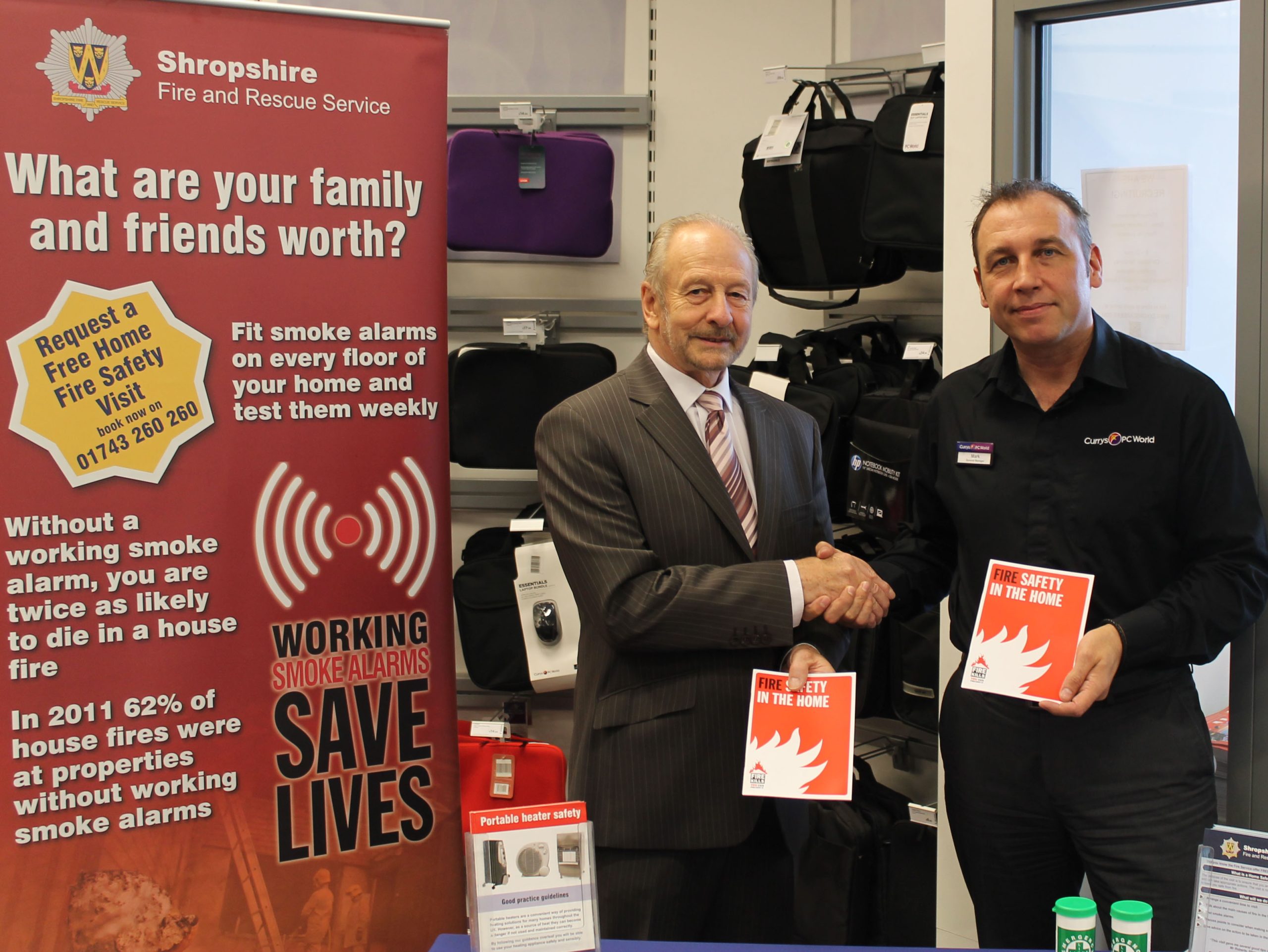Shropshire and Wrekin Fire Authority Chairman Stuart West launches the electrical safety campaign with Shrewsbury store manager Mark Brennan.